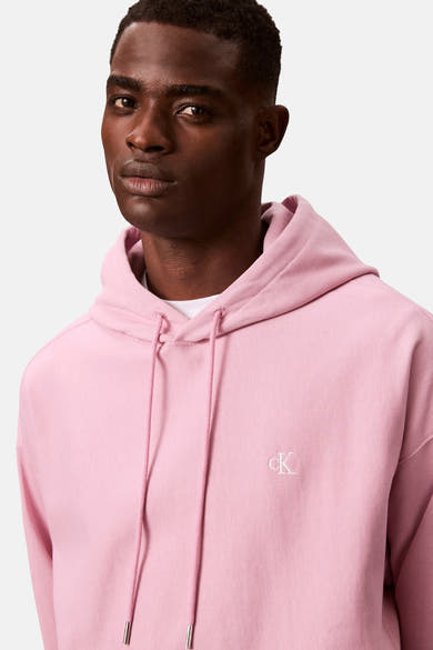 Sweat à capuche rose de Calvin Klein avec cordon de serrage et logo brodé.