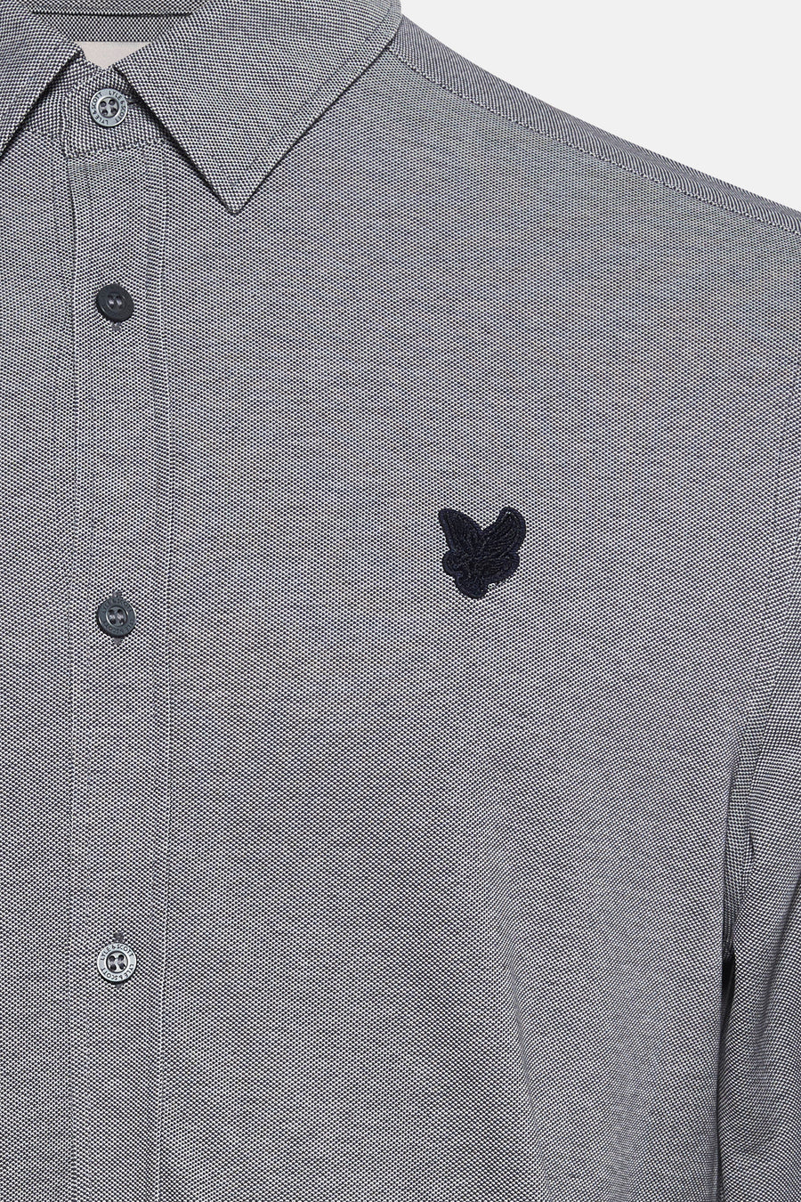 Blauwe blouse met lange mouwen van LYLE & SCOTT, met een textuurpatroon en geborduurd logo.