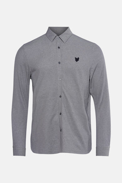 Blauwe blouse met lange mouwen van LYLE & SCOTT, met subtiel textuurpatroon en geborduurd logo.