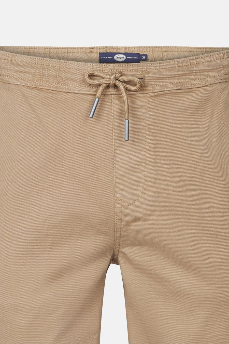 Korte beige short van Petrol Industries, met trekkoord en metalen afwerkingen.
