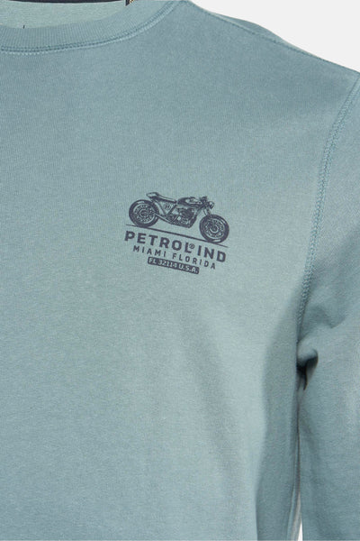 Zwembroek blauw van Petrol Industries, met een motormotief en lettering op de voorzijde.