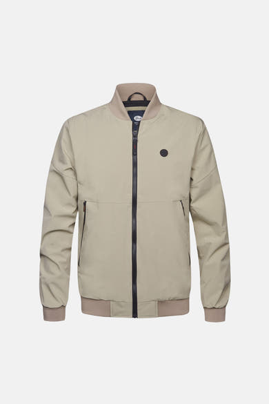 Veste courte beige de Petrol Industries® avec fermeture éclair noire sur fond uni.