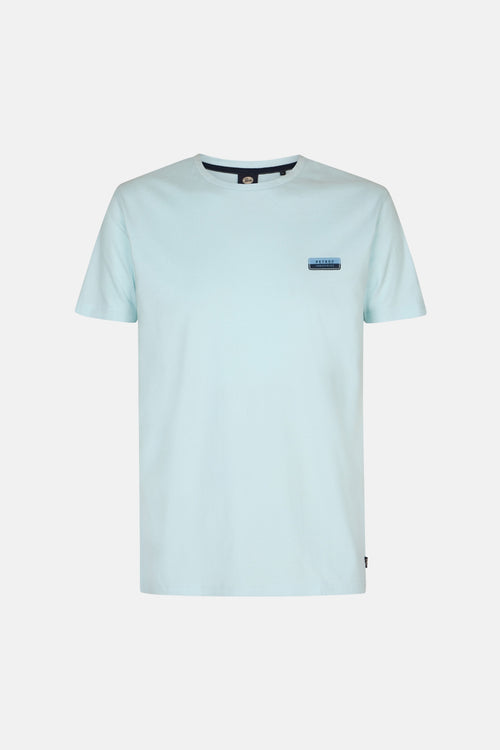T-shirt à manches courtes vert clair de Petrol Industries, avec un écusson logo sur la poitrine.