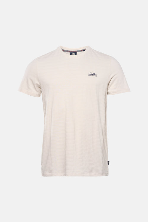 T-shirt beige à manches courtes de Petrol Industries, avec un motif subtil et un petit logo imprimé.