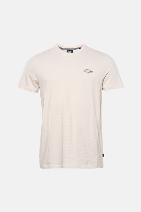 T-shirt beige à manches courtes de Petrol Industries, avec un motif subtil et un petit logo imprimé.