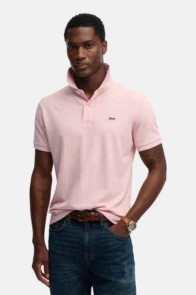 Roze poloshirt met korte mouwen van SUPERDRY, met klassieke kraag en discreet logo op de borst.