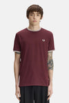 Bordeaux short-sleeve t-shirt by Fred Perry with white ribbed collar and cuffs, small embroidered laurel wreath logo on chest, front view