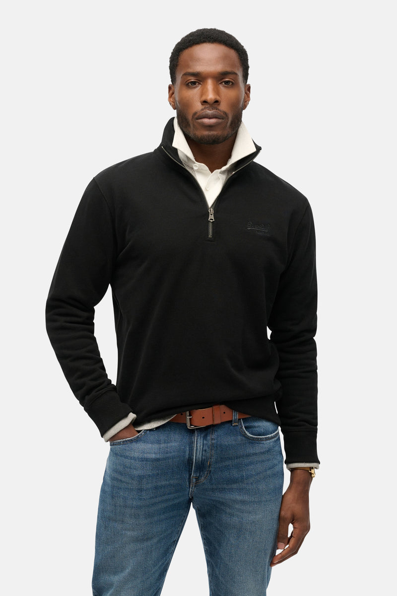 Zwarte trui met opstaande kraag van SUPERDRY, met zilveren ritssluiting en geborduurd logo.