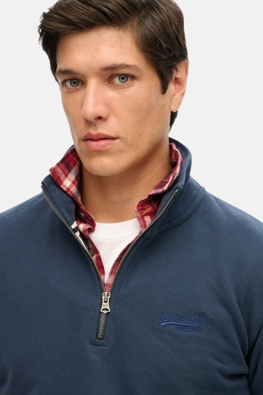 Sweat col montant bleu de SUPERDRY avec fermeture éclair et motif à carreaux au col.