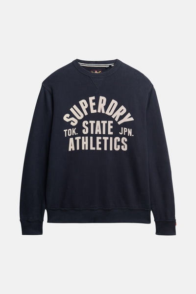 Sweat-shirt bleu marine à col rond de Superdry, avec motif «Superdry State Athletics» sur le devant.