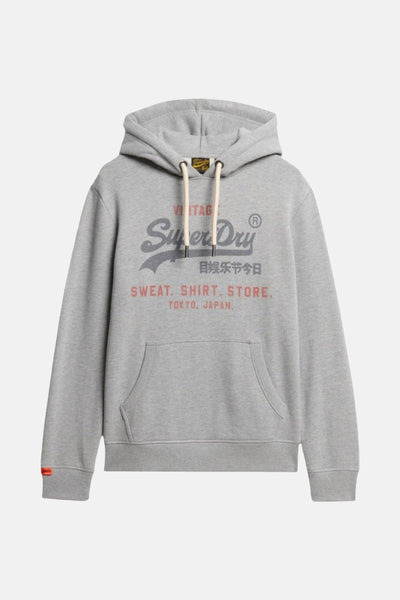 Superdry zweetjas, grijs, met een trekker en logo opgedrukt op de voorzijde.