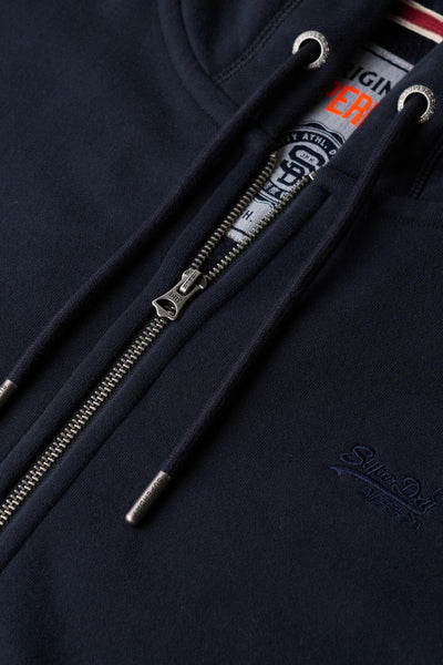 Donkerblauwe SUPERDRY bodywarmer met zilveren ritssluiting en trekkoord in de capuchon.