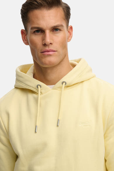 Sweat à capuche jaune de SUPERDRY avec cordon de serrage et logo brodé ton sur ton.