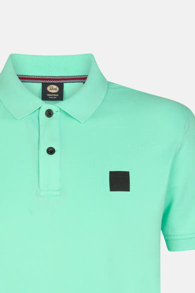 Lichtgroen poloshirt van Petrol Industries, met geribde kraag en vierkant logo aan de zijkant.