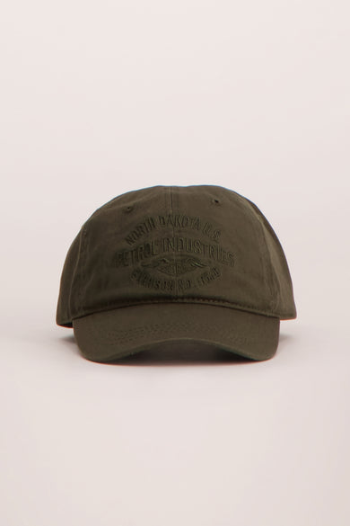 Olive green baseball cap with embroidered vintage-style logo, front view, textured cotton fabric