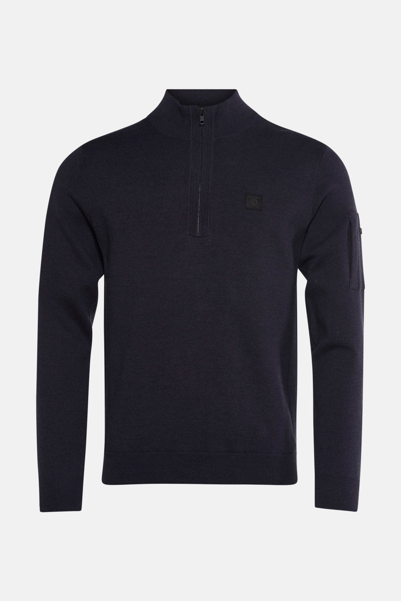 Pull à col roulé bleu marine de Petrol Industries, avec fermeture éclair et poche sur la manche.