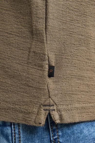 Groen poloshirt met korte mouwen van Petrol Industries, met pique textuurdetail en een zwart opgestikt label.