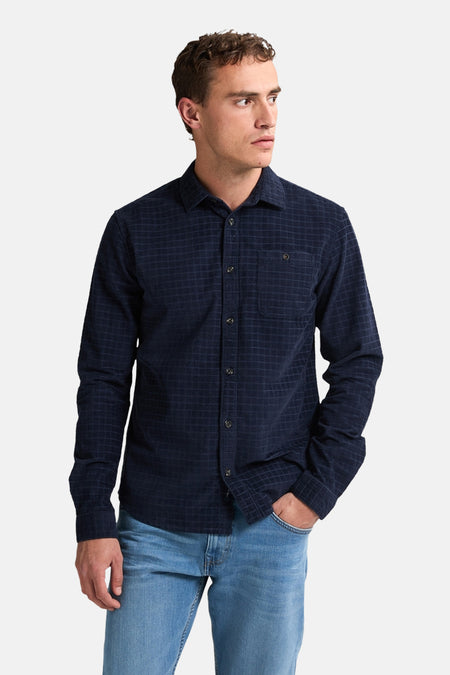 Blauwe blouse met lange mouwen van Petrol Industries met een ruitpatroon en een borstzak.