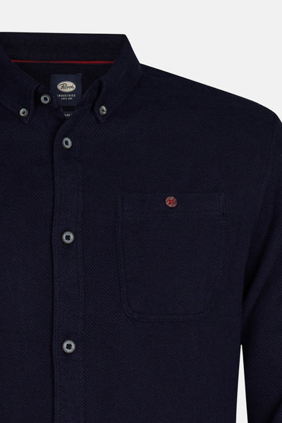 Chemise à manches longues bleue de Petrol Industries, avec poche de poitrine boutonnée.