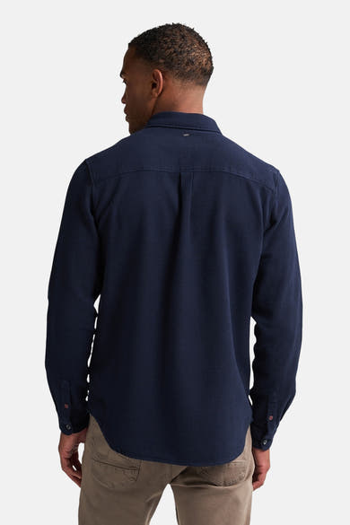 Blauwe blouse met lange mouwen van Petrol Industries®, achterzijde met naaddetails.