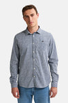 Blauwe blouse met lange mouwen van Petrol Industries met gespikkeld patroon en borstzak.