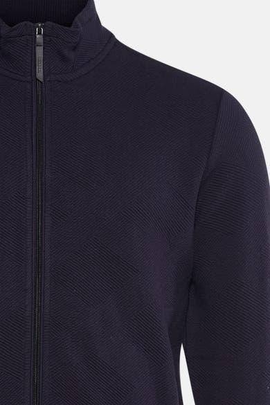 Blauwe bodywarmer van Petrol Industries, textuurvisgraatpatroon met zichtbare ritssluiting.