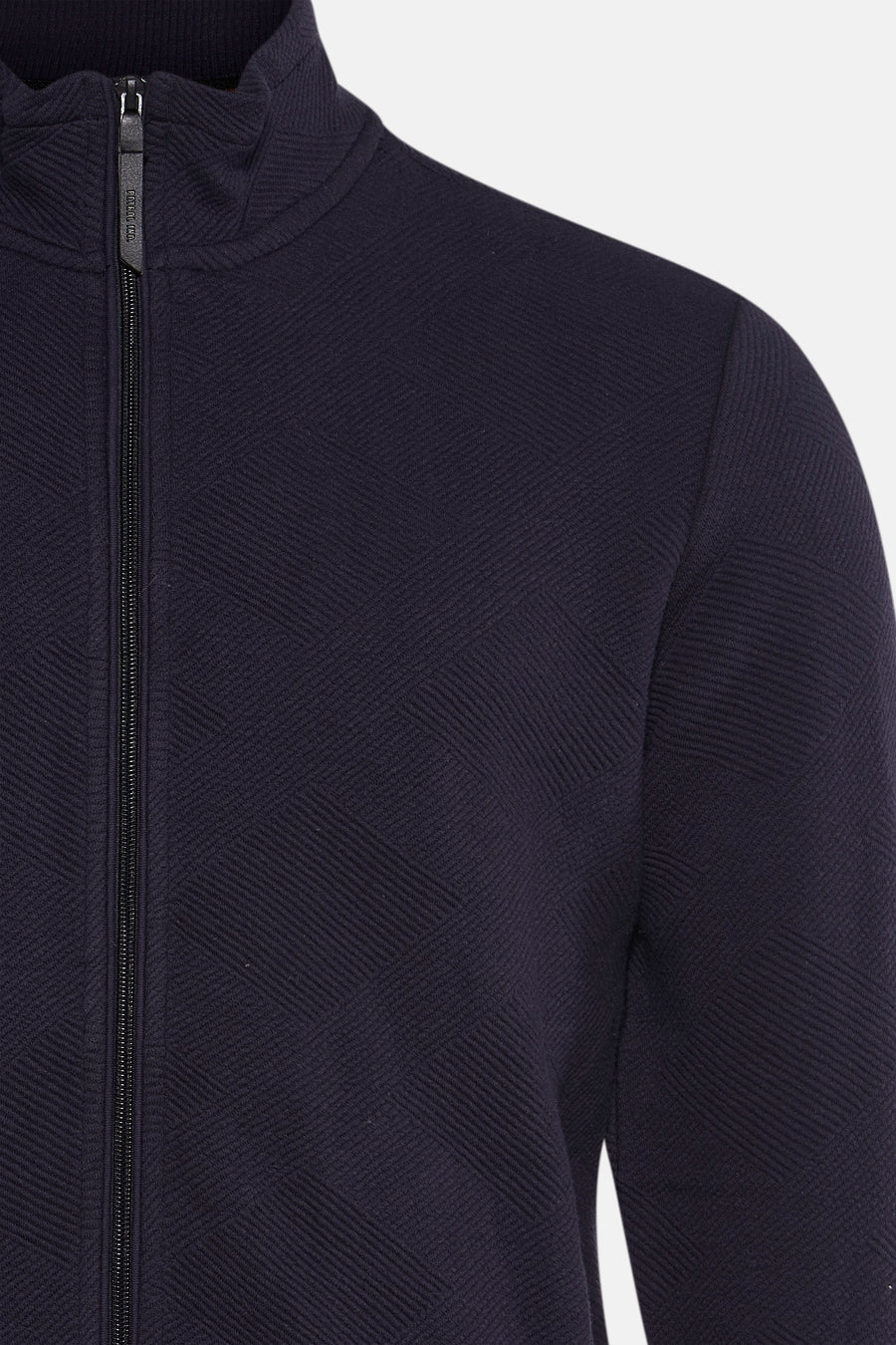 Blauwe bodywarmer van Petrol Industries, textuurvisgraatpatroon met zichtbare ritssluiting.