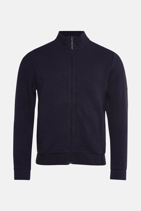 Blauwe bodywarmer van Petrol Industries, met ritssluiting middenvoor en subtiele patroontextuur.