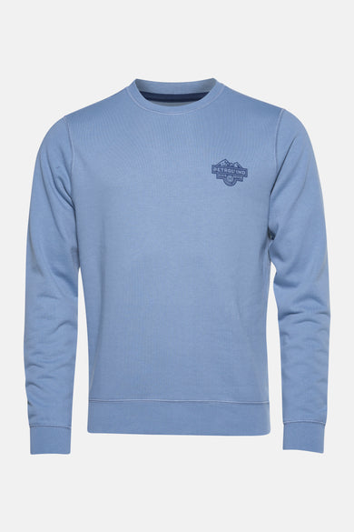 Blauwe sweater van Petrol Industries met een grafische print op de borst.