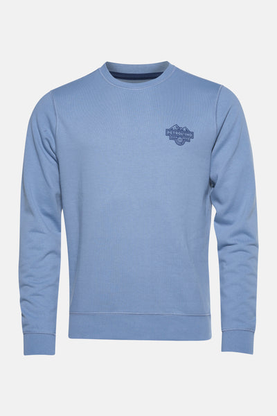 Blauwe sweater van Petrol Industries met een grafische print op de borst.