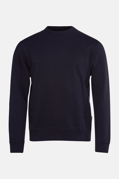 Ronde hals trui blauw van Petrol Industries met een klein logo op de borst.