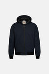 Navy blue short hooded jacket by Fred Perry with front zipper, ribbed cuffs and hem, and visible brand tag at collar.