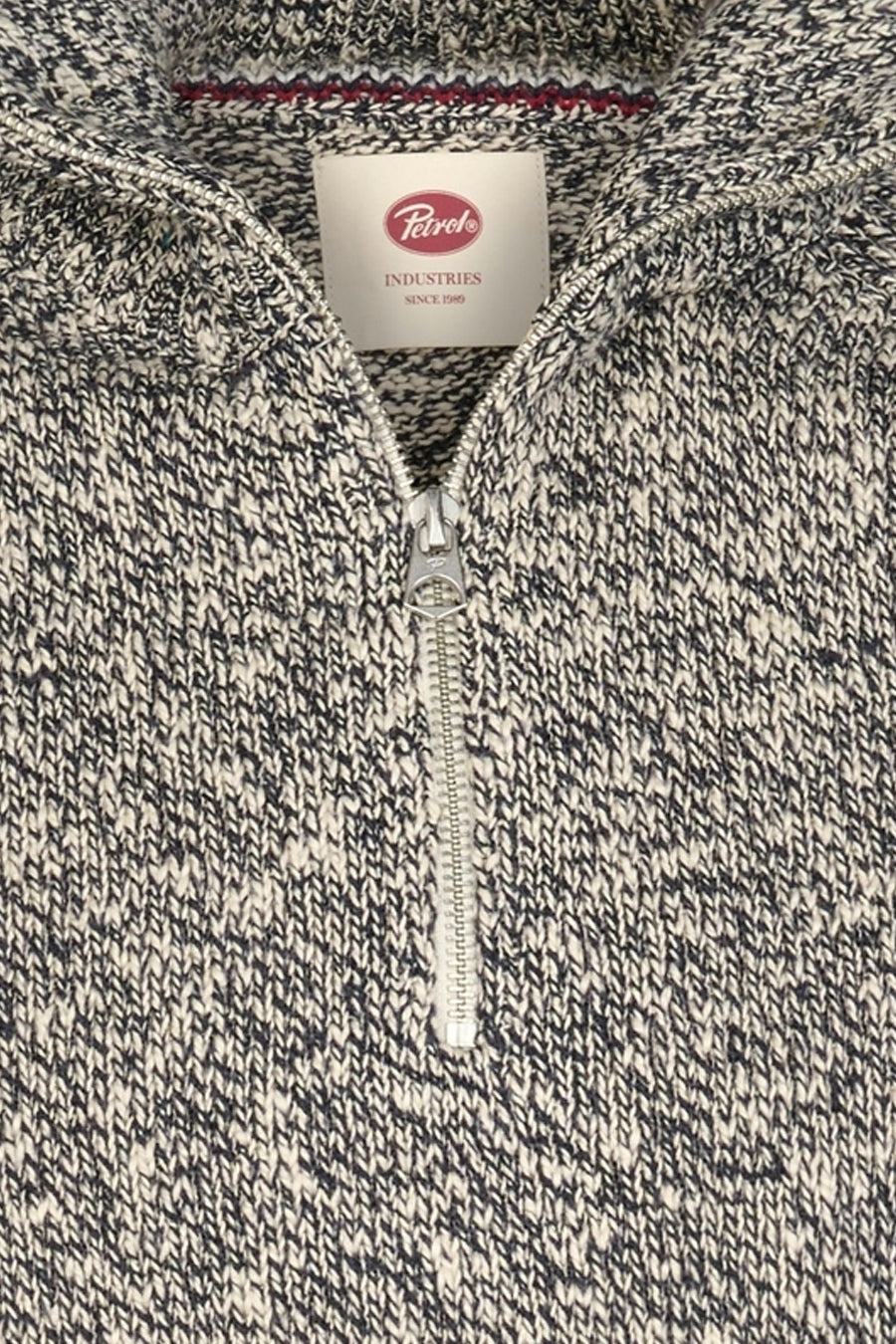 Blue marled knit half-zip sweater by Petrol, featuring textured herringbone pattern and silver zipper, close-up front view