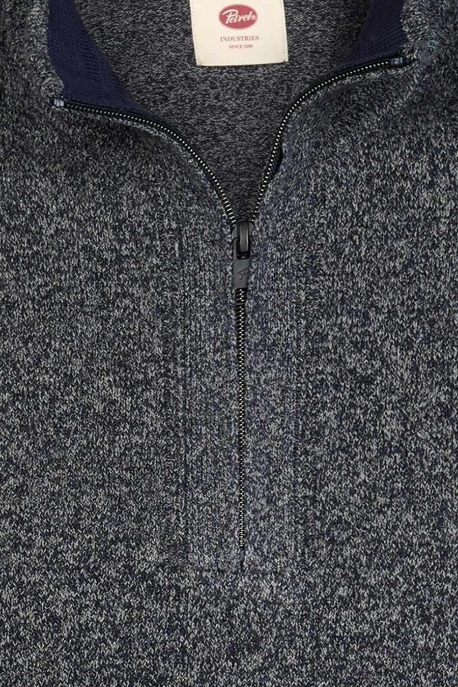 Blue marled knit half-zip sweater by Petre, featuring ribbed collar and front zipper, close-up view