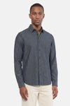Blue long-sleeve shirt with textured fabric and button-down front, worn by model in lifestyle front view