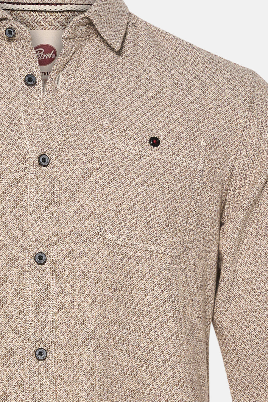 Beige long-sleeve shirt with herringbone texture by Petrol, featuring chest pocket and button-down front, close-up view