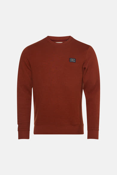 Rouge textured crewneck sweatshirt by Petrol Ind & Co, featuring ribbed cuffs and hem with small chest patch label, front view.