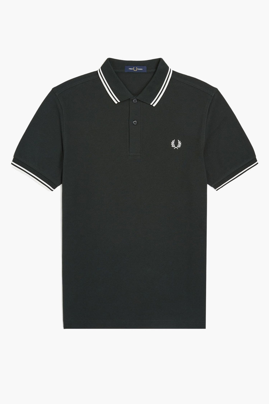 Polo vert par FRED PERRY avec double liseré blanc au col et aux manches, logo brodé.