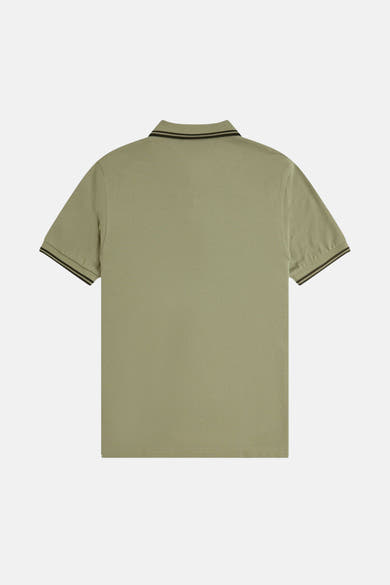 Polo olive à manches courtes de Fred Perry, avec rayures noires sur le col et les manches.