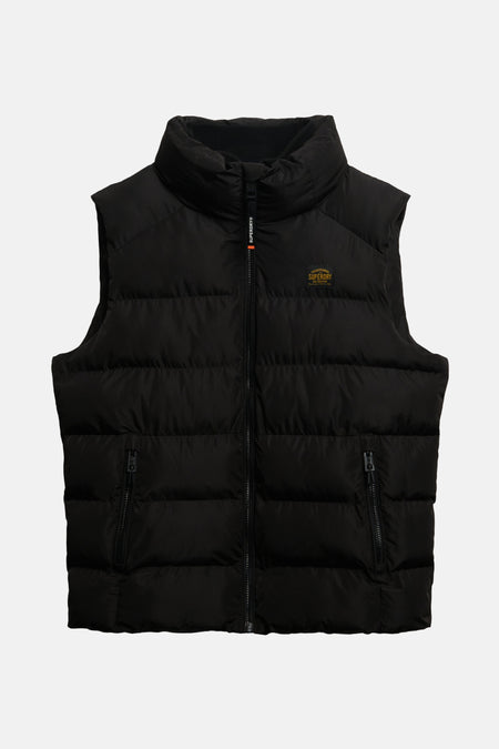 Veste sans manches noire de SUPERDRY, matelassée avec fermeture éclair et poches zippées.