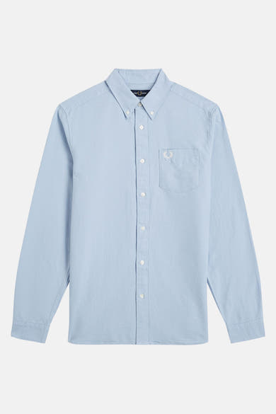 Lichtblauw overhemd met lange mouwen van FRED PERRY, met borstzak versierd met het iconische logo.