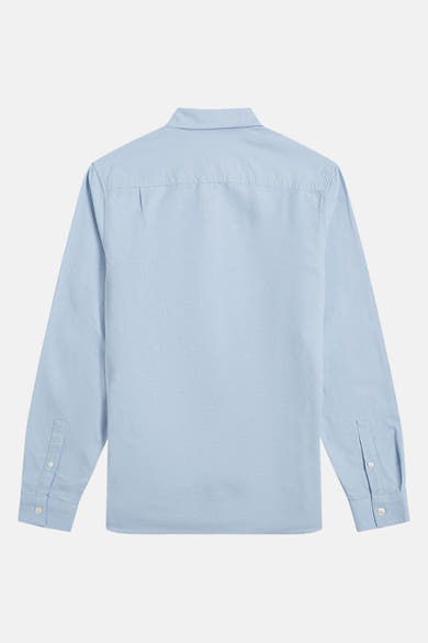 Blauwe blouse met lange mouwen van FRED PERRY, van achteren gezien, met knoopmanchetten.