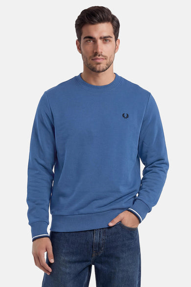 Blauwe rondehals sweatshirt van FRED PERRY met zwart laurierlogo en geribde manchetten met strepen.