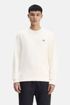 Ecru crewneck sweatshirt by Fred Perry with small embroidered laurel wreath, ribbed cuffs and hem, lime and grey striped trim, front view on model