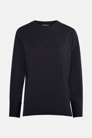 Blauwe T-shirt met lange mouwen van ADORE, met rechte manchetten en effen achtergrond.