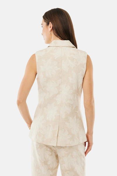 Blazer beige à motif floral de MEXX, avec un col tailleur et une coupe sans manches.
