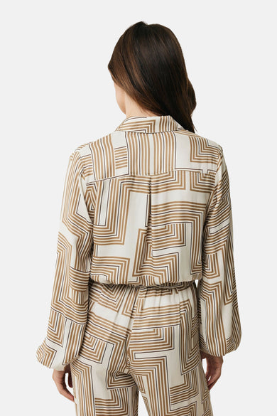 Chemisier beige à manches longues de MEXX, motif géométrique marron et noir, vue de dos.
