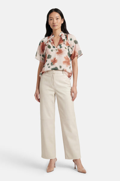 Chemisier à manches courtes multicolore de MEXX, avec motif floral et détail volanté au col.