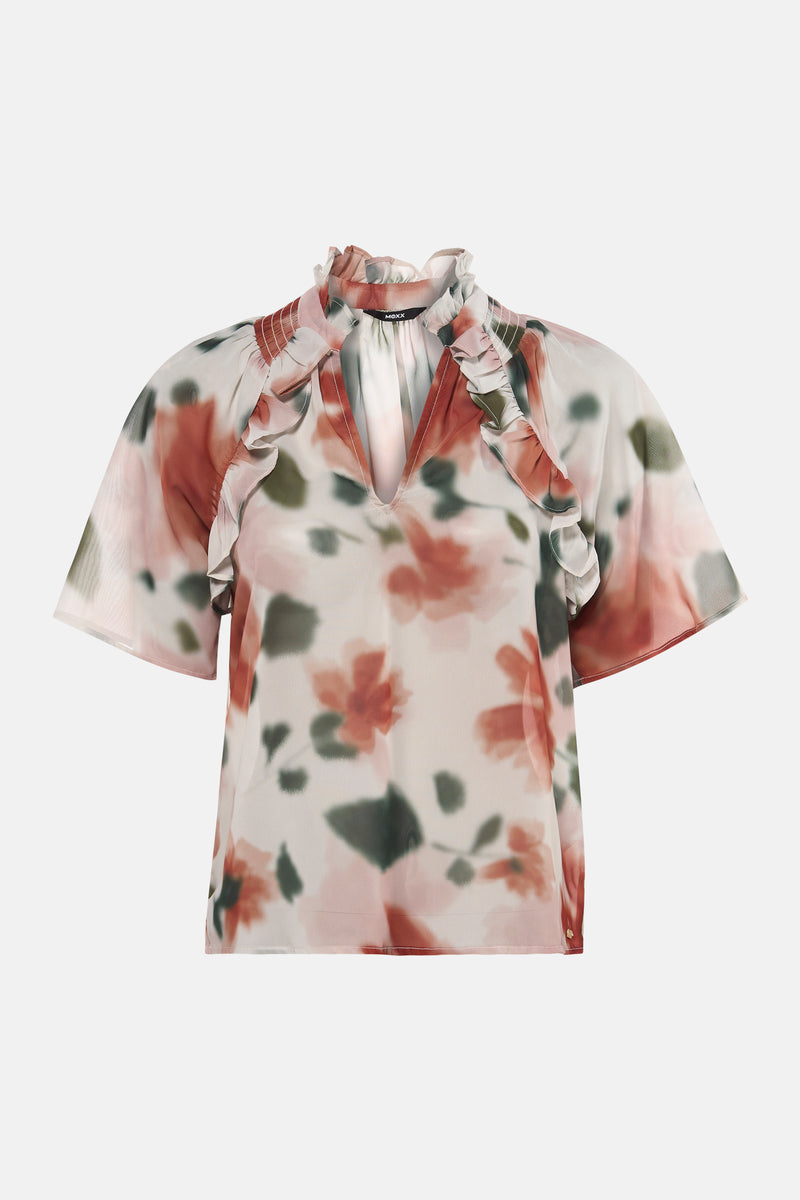 Chemisier multicolore à manches courtes de MEXX, avec imprimé floral flou et volants décoratifs.
