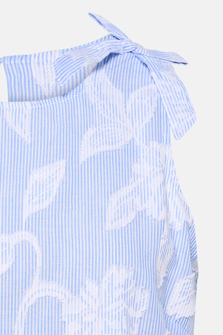 Chemisier bleu sans manches de MEXX, rayures avec motif floral blanc et détail noué à l'épaule.